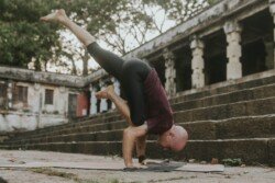 Alan in Eka Pada Bakasana A (One-Legged Crow Pose A), advanced balance in Ashtanga Yoga (Advanced Series - Sthira Bhaga)
