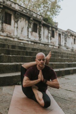 Alan in Viranchyasana A (Sage Viranchi A Pose), advanced balance and twist in Yoga (Advanced Series - Sthira Bhaga)